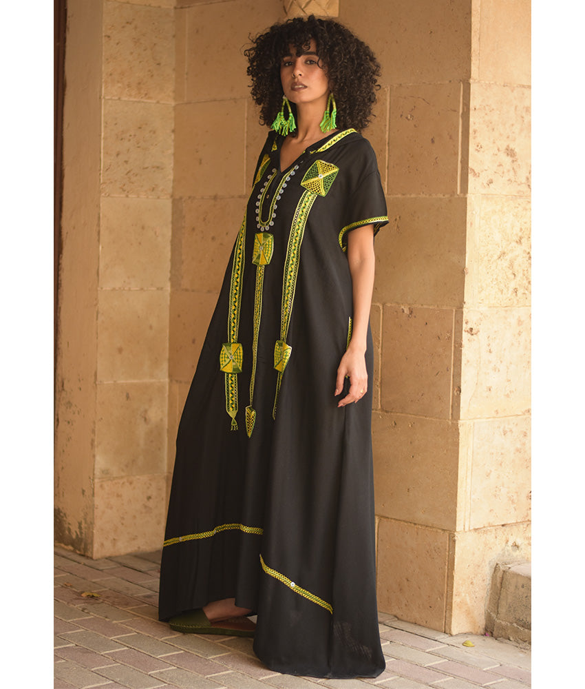 Black Siwa Heavily Embroidered Linen Dress with Hoodie handmade in Egypt & available at Jozee Boutique.