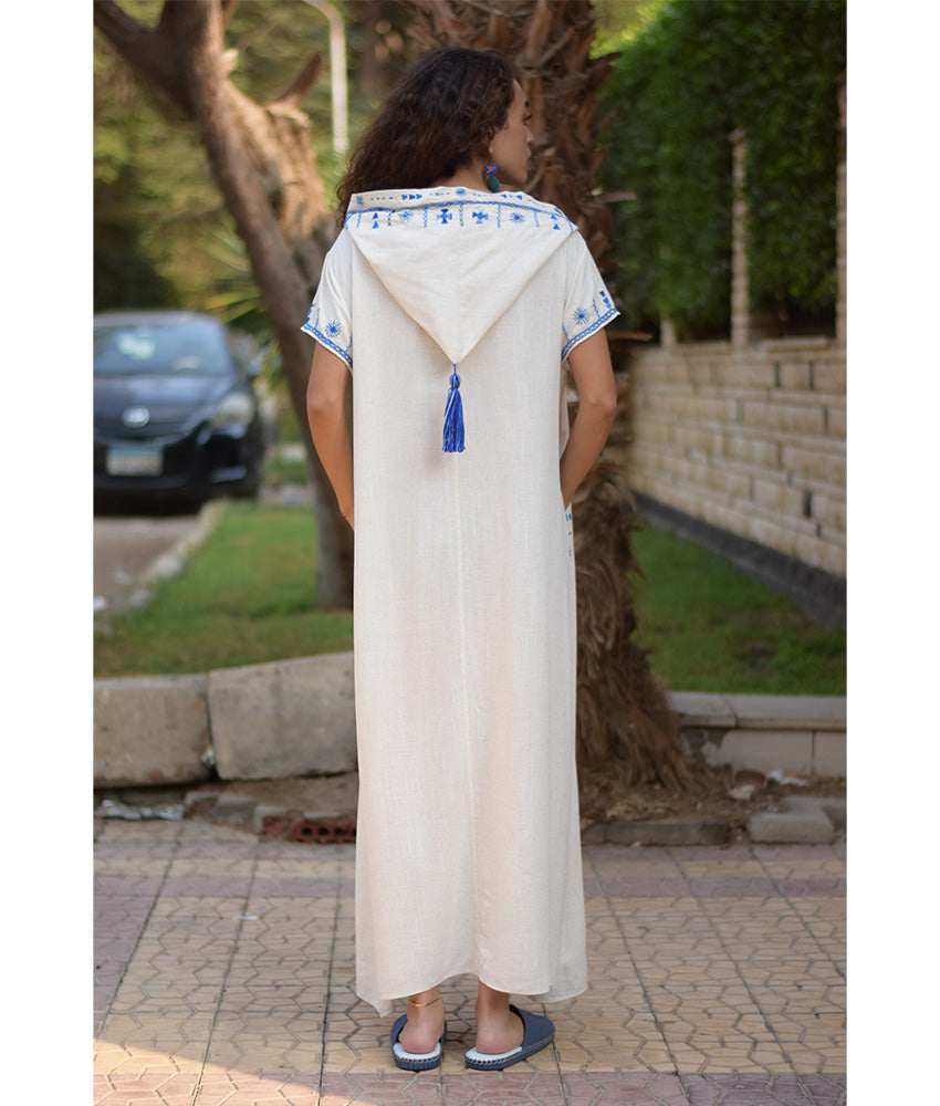 White Siwa Heavily Embroidered Linen Dress with Hoodie handmade in Egypt & available at Jozee Boutique.