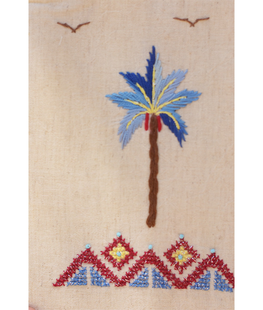 Off white Embroidered Palm Linen Cross Bag handmade in Egypt & available at Jozee Boutique.handmade in Egypt & available at Jozee Boutique.