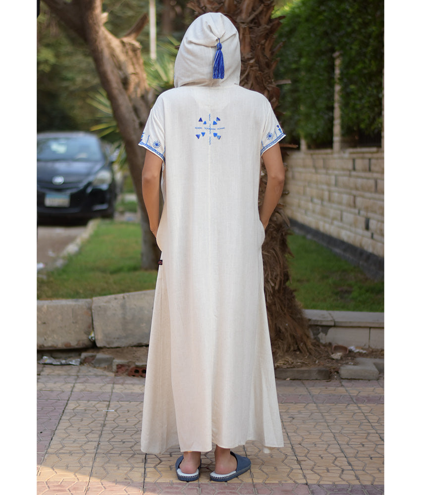White Siwa Heavily Embroidered Linen Dress with Hoodie handmade in Egypt & available at Jozee Boutique.
