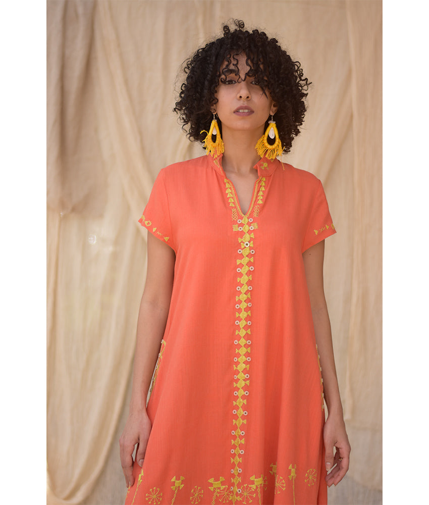 Orange Siwa Embroidered Linen Japanese Dress handmade in Egypt & available at Jozee Boutique.