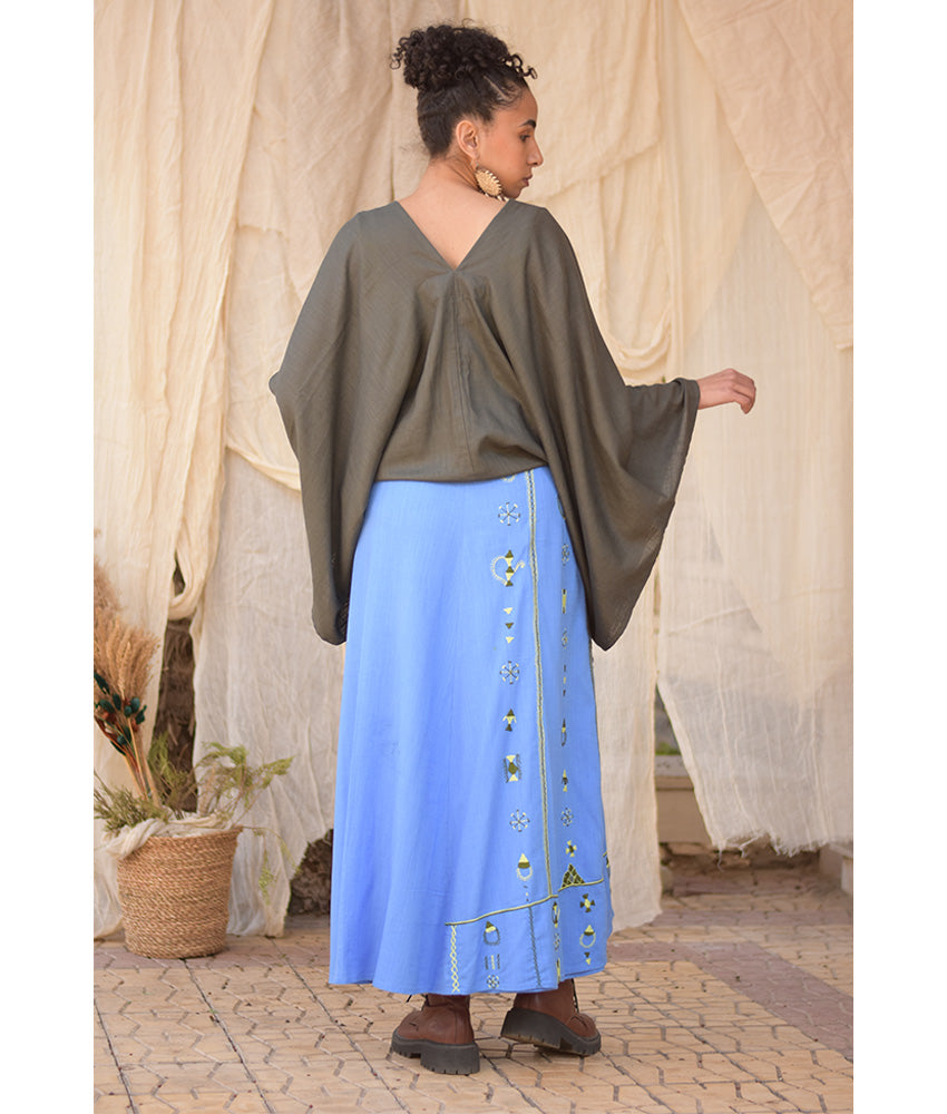 Denim Blue Siwa Embroidered Linen Wrap Skirt handmade in Egypt & available at Jozee Boutique.
