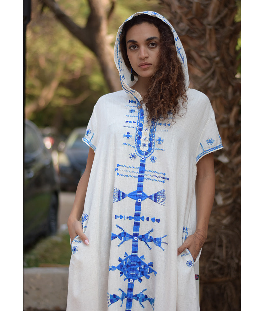 White Siwa Heavily Embroidered Linen Dress with Hoodie handmade in Egypt & available at Jozee Boutique.