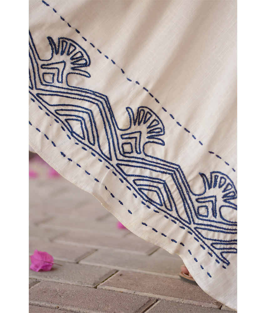Off-White Linen Dress with Ancient Egyptian Lotus Embroidery handmade in Egypt & available at Jozee Boutique.