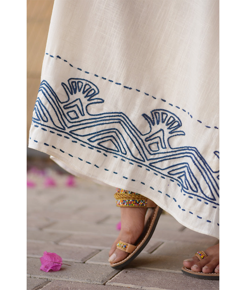 Off-White Linen Dress with Ancient Egyptian Lotus Embroidery handmade in Egypt & available at Jozee Boutique.