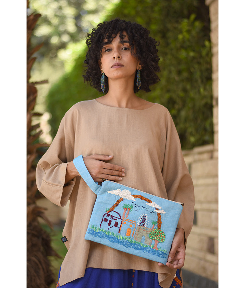 Baby Blue Embroidered Clutch handmade in Egypt & available at Jozee Boutique.