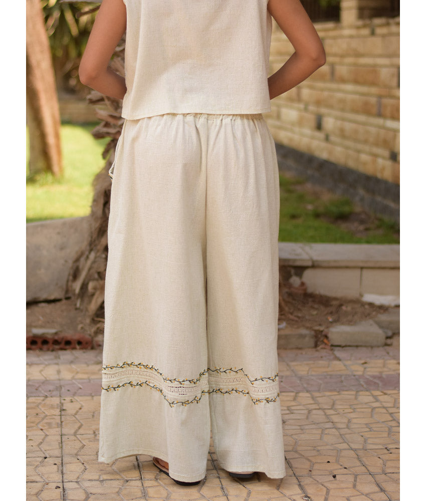 Off White Linen Set with Hand Embroideries handmade in Egypt & available at Jozee Boutique.