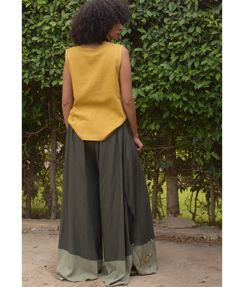 Dark Olive Green Siwa Embroidered Flowy Pants handmade in Egypt & available at Jozee Boutique.