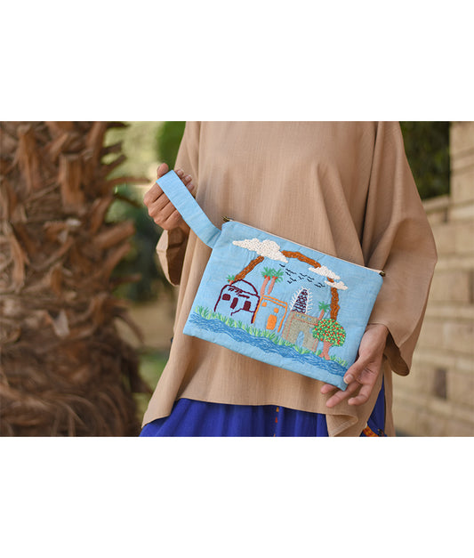 Baby Blue Embroidered Clutch handmade in Egypt & available at Jozee Boutique.