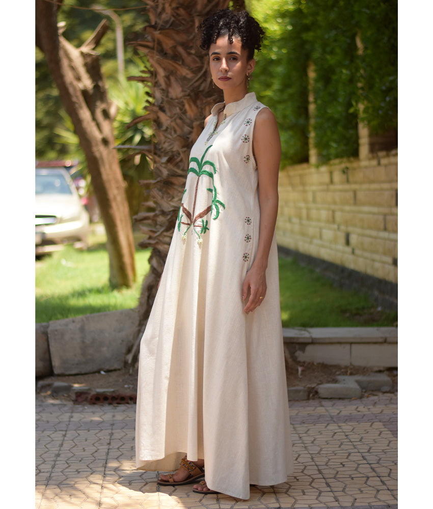Off White Siwa Embroidered Linen Japanese Dress handmade in Egypt & available at Jozee Boutique.