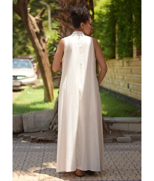 Off White Siwa Embroidered Linen Japanese Dress handmade in Egypt & available at Jozee Boutique.