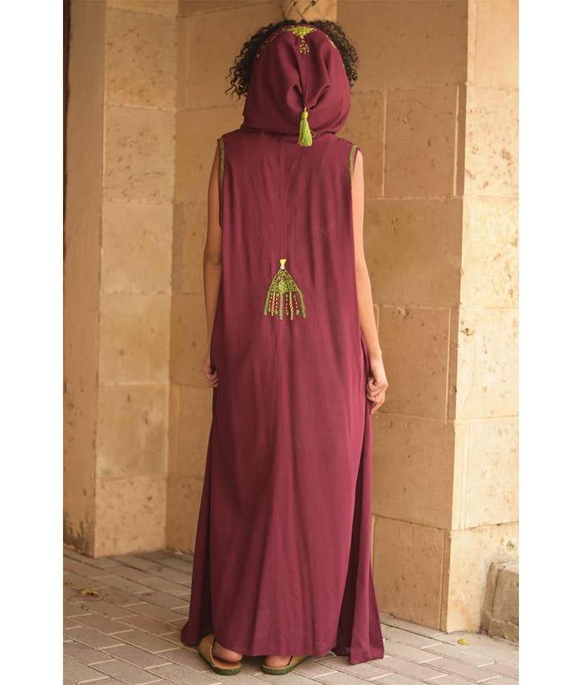 Burgundy Siwa Heavily Embroidered Linen Dress with Hoodie handmade in Egypt & available at Jozee Boutique.