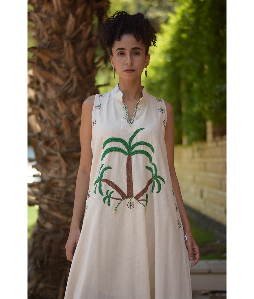 Off White Siwa Embroidered Linen Japanese Dress handmade in Egypt & available at Jozee Boutique.
