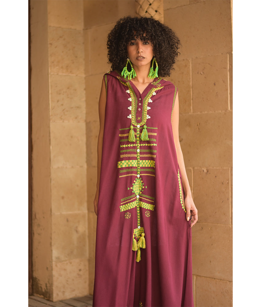 Burgundy Siwa Heavily Embroidered Linen Dress with Hoodie handmade in Egypt & available at Jozee Boutique.