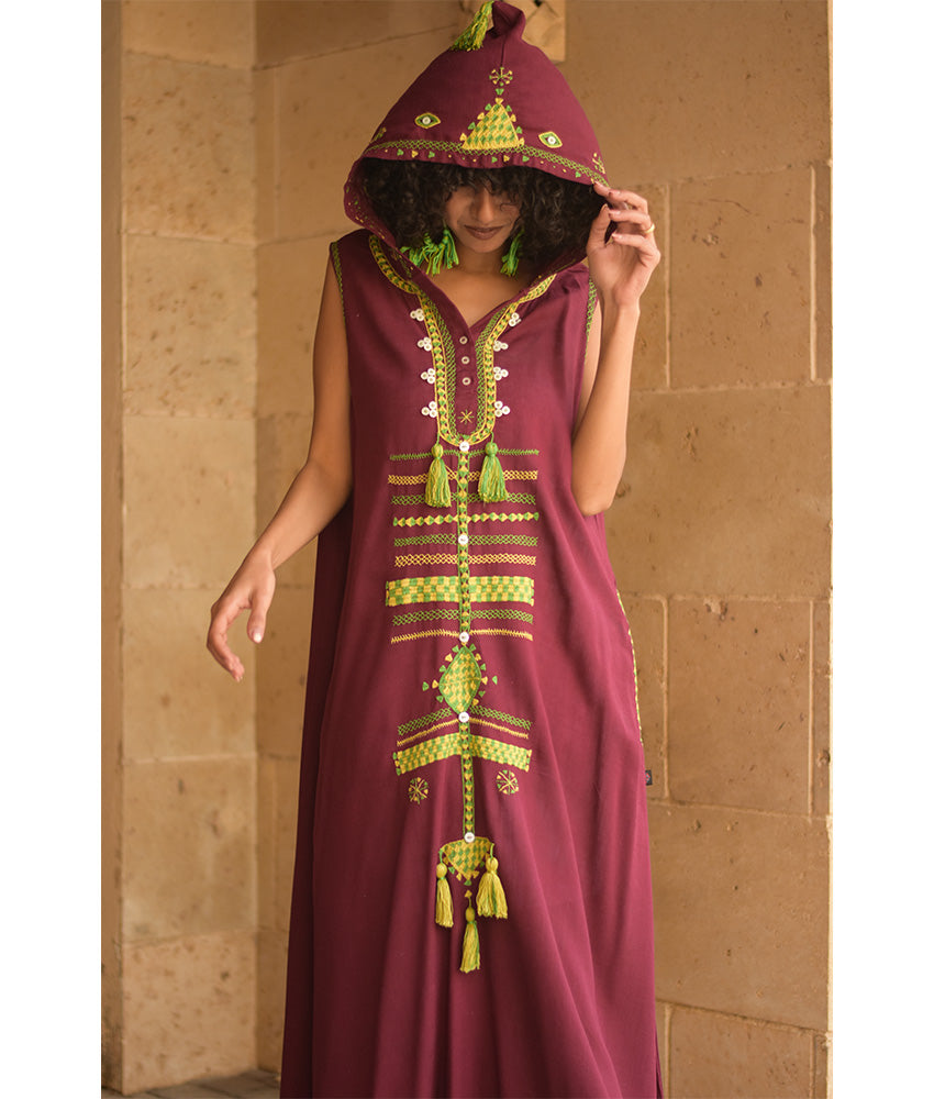 Burgundy Siwa Heavily Embroidered Linen Dress with Hoodie handmade in Egypt & available at Jozee Boutique.