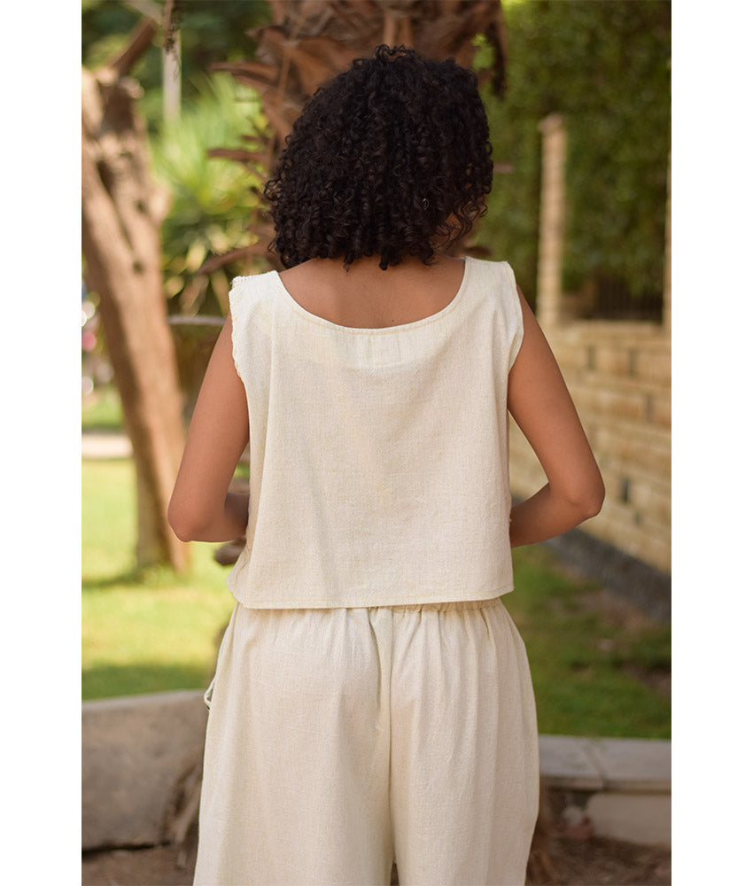 Off White Linen Set with Hand Embroideries handmade in Egypt & available at Jozee Boutique.