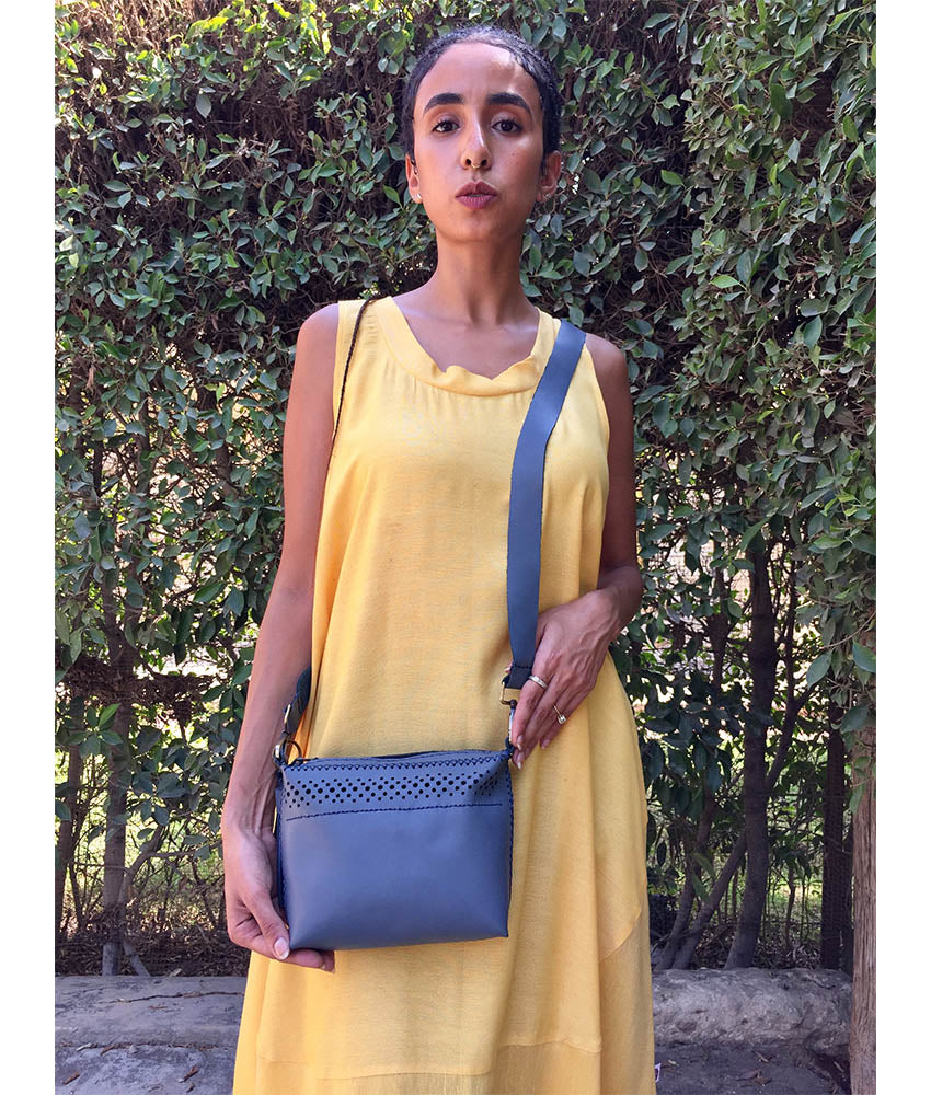 Grey Genuine Leather pouch handmade in Egypt and available at Jozee Boutique.