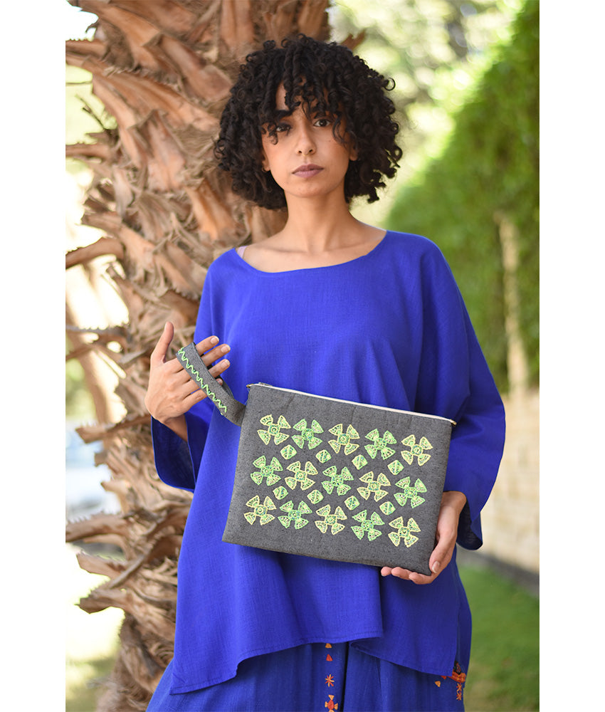 Grey Embroidered Clutch handmade in Egypt & available at Jozee Boutique.