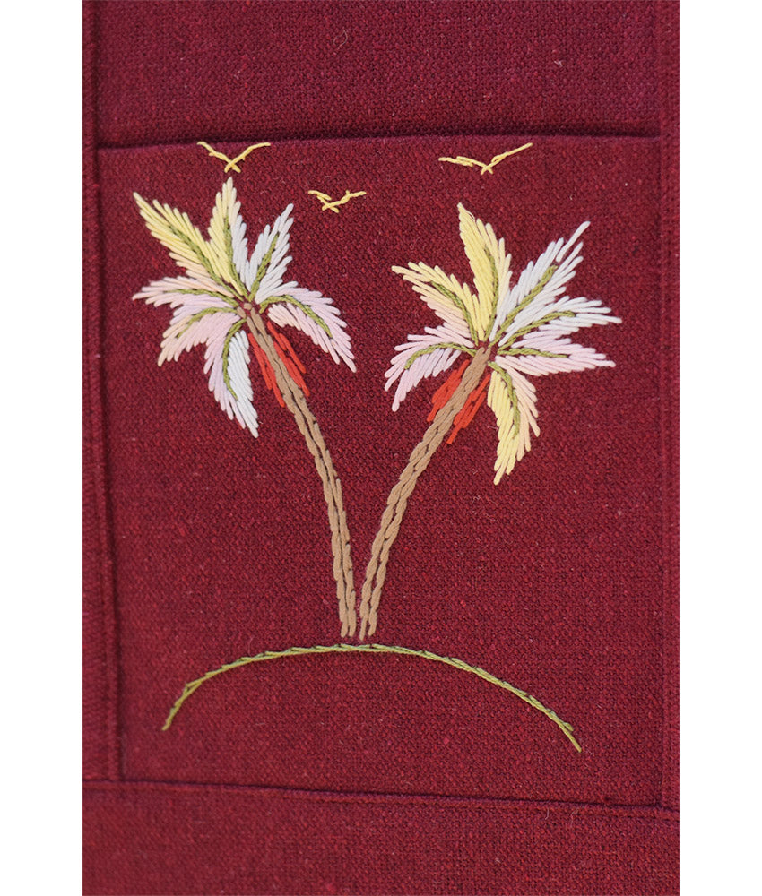 Burgundy Embroidered Palm Linen Padded Laptop Bag handmade in Egypt & available at Jozee Boutique.handmade in Egypt & available at Jozee Boutique.