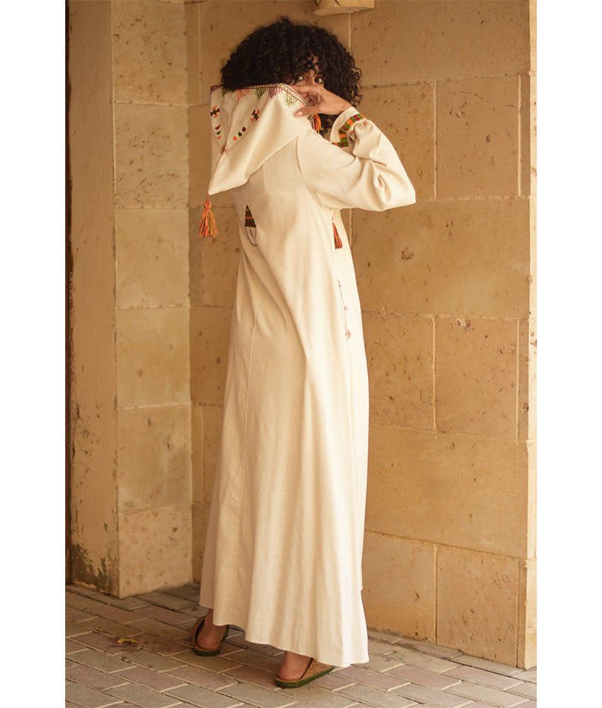 Off white Siwa Embroidered Linen Dress with Hoodie handmade in Egypt & available at Jozee Boutique.