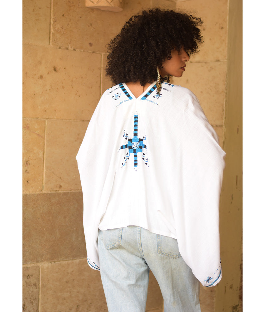 White Siwa Embroidered Linen Bolero made in Egypt & available at Jozee Boutique.