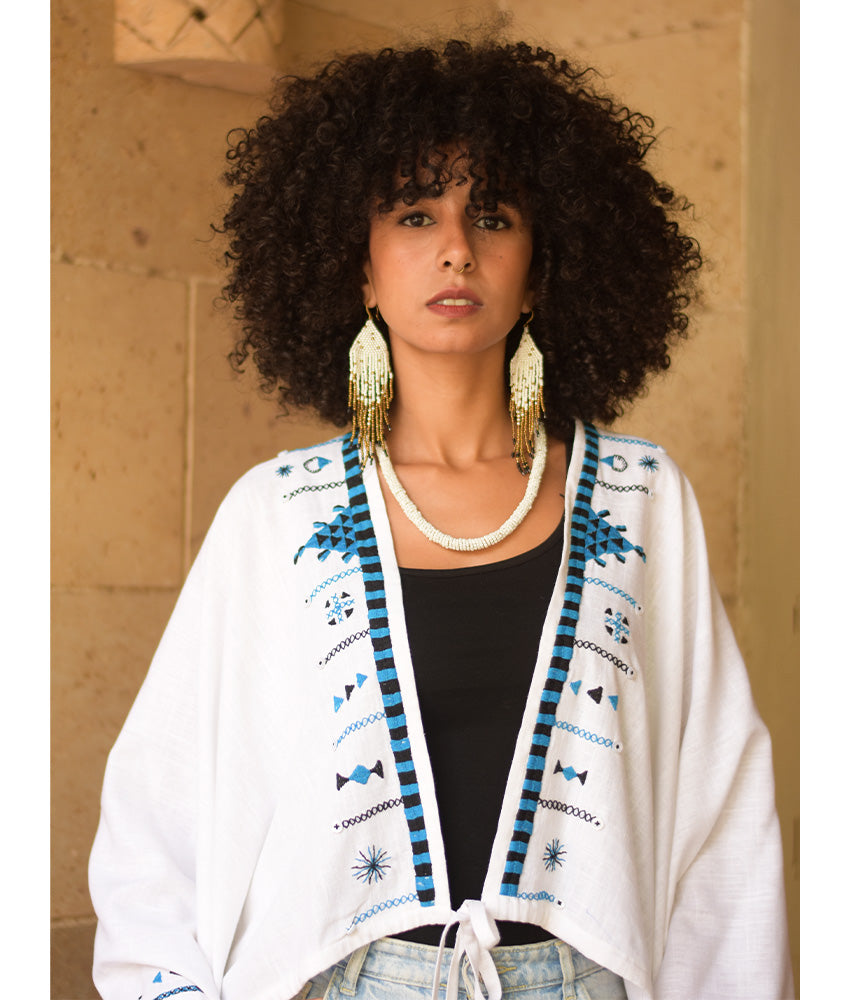 White Siwa Embroidered Linen Bolero made in Egypt & available at Jozee Boutique.