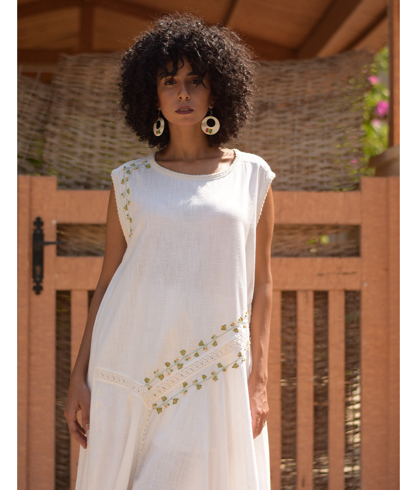 White Linen Dress with Hand Embroideries handmade in Egypt & available in Jozee boutique