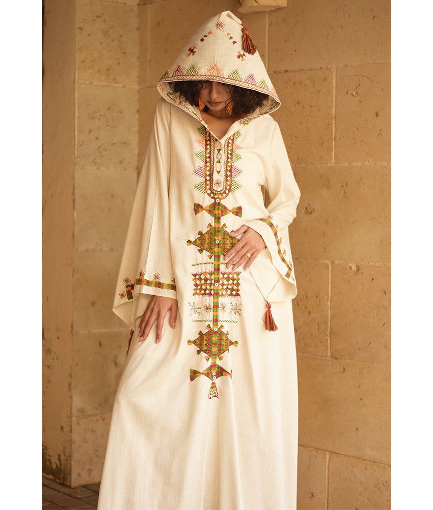 Off white Siwa Embroidered Linen Dress with Hoodie handmade in Egypt & available at Jozee Boutique.