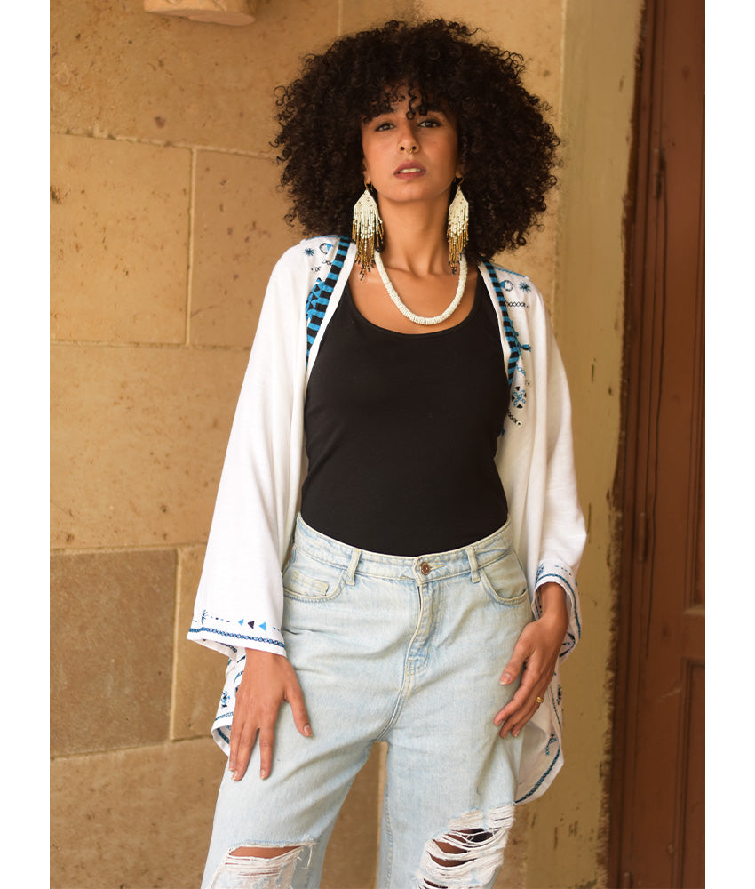 White Siwa Embroidered Linen Bolero made in Egypt & available at Jozee Boutique.