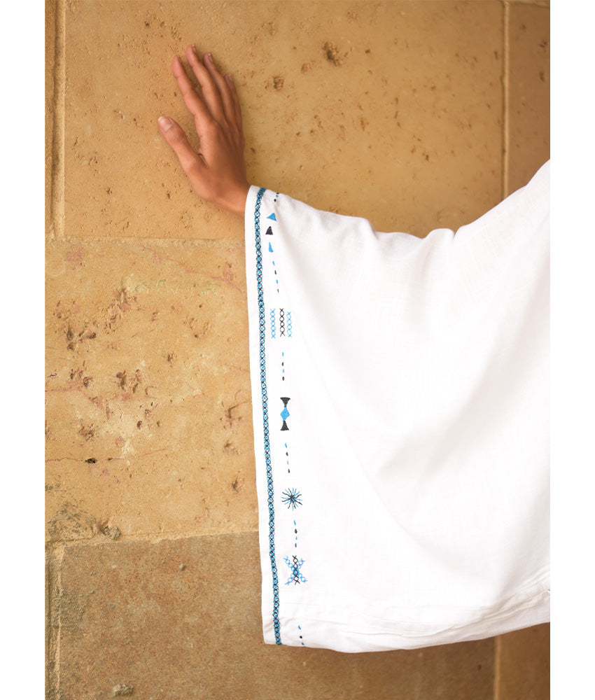 White Siwa Embroidered Linen Bolero made in Egypt & available at Jozee Boutique.