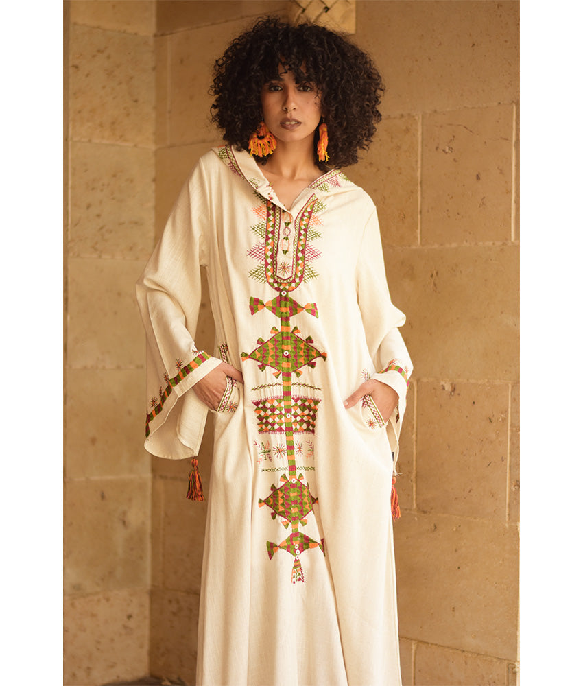 Off white Siwa Embroidered Linen Dress with Hoodie handmade in Egypt & available at Jozee Boutique.