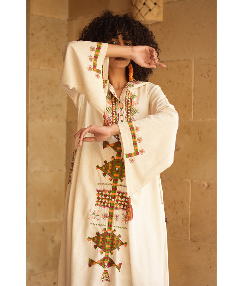 Off white Siwa Embroidered Linen Dress with Hoodie handmade in Egypt & available at Jozee Boutique.