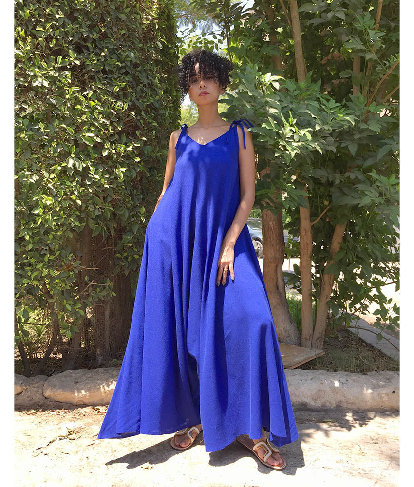 Electric Blue Flowy Jumpsuit/Dress handmade in Egypt & available at Jozee Boutique.