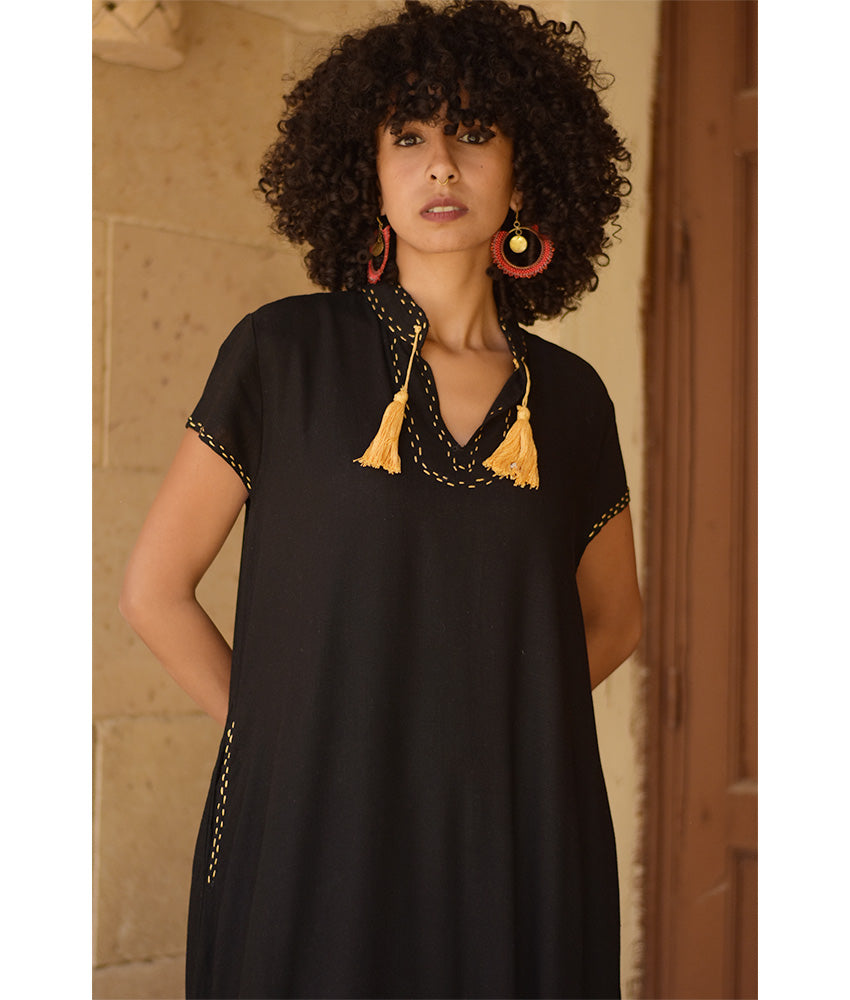 Black Linen Dress with Ancient Egyptian Lotus Embroidery handmade in Egypt & available at Jozee Boutique.