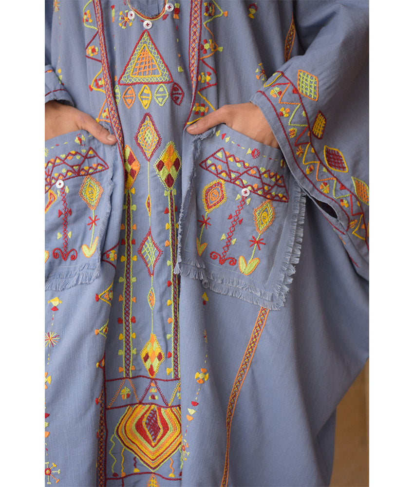 Denim blue Siwa Heavily Embroidered Linen Kaftan with Hoodie handmade in Egypt & available at Jozee Boutique.