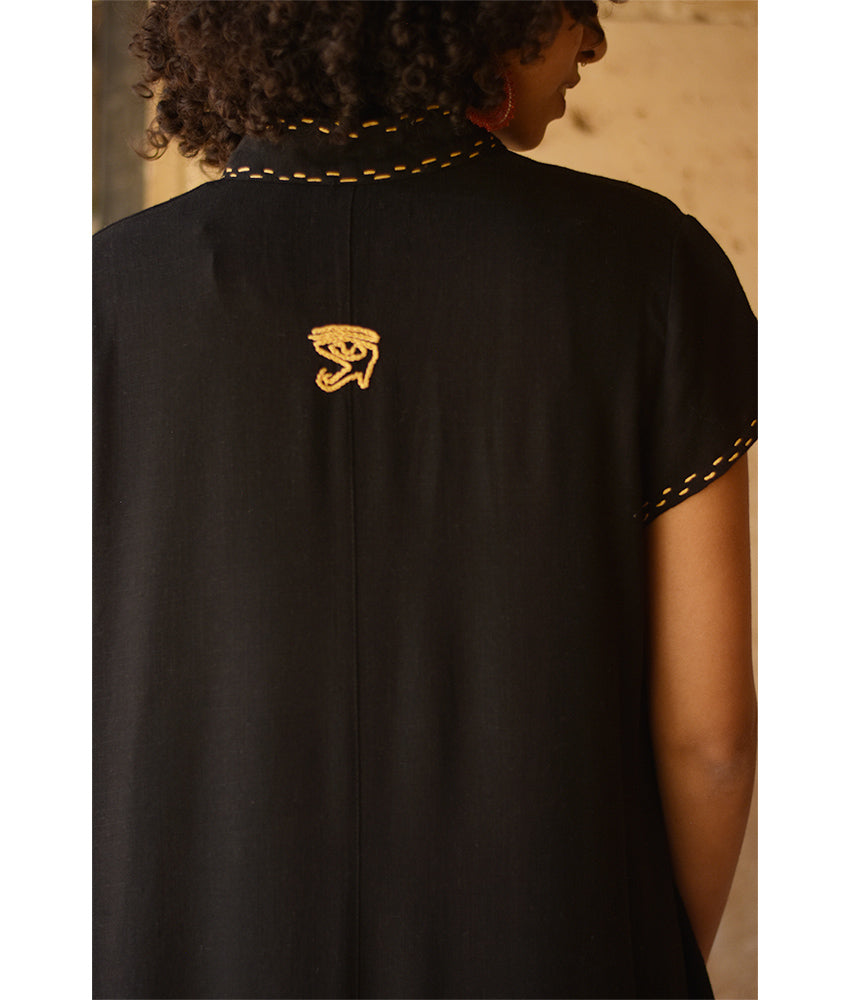 Black Linen Dress with Ancient Egyptian Lotus Embroidery handmade in Egypt & available at Jozee Boutique.