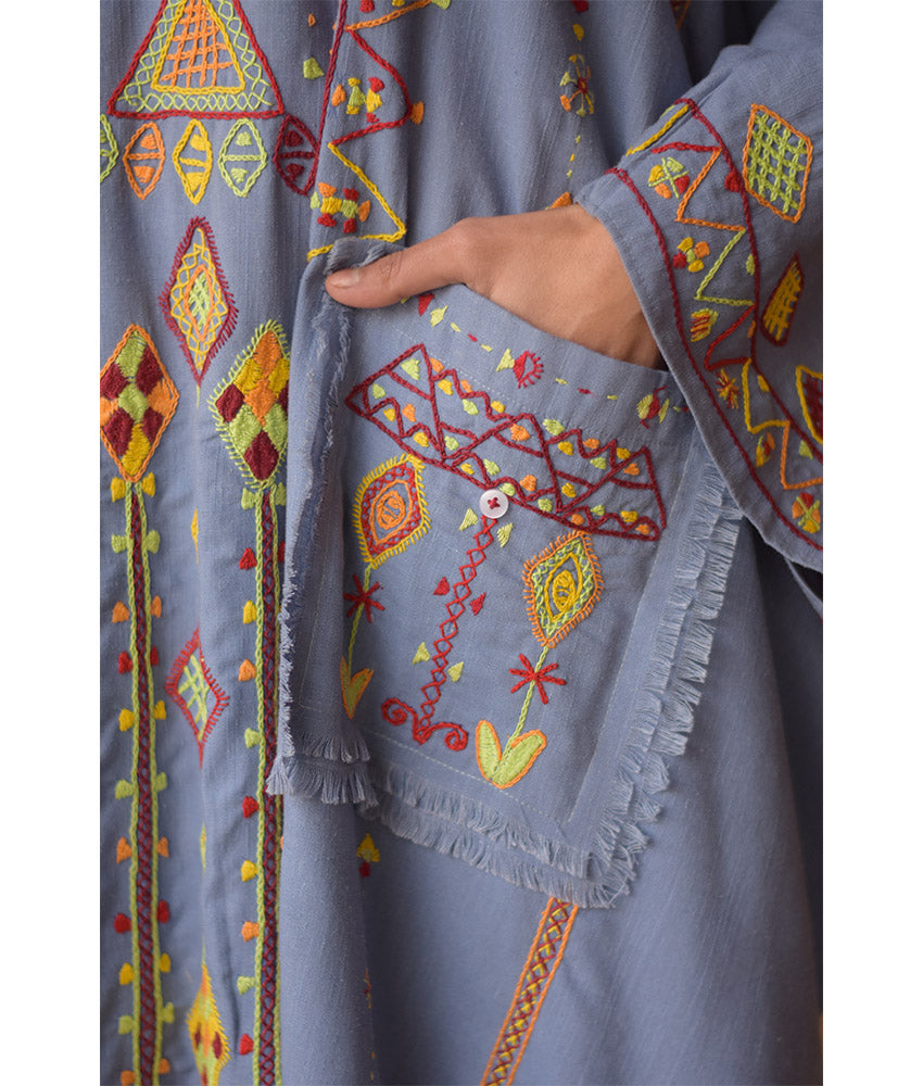 Denim blue Siwa Heavily Embroidered Linen Kaftan with Hoodie handmade in Egypt & available at Jozee Boutique.