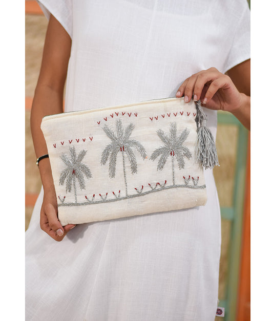 Off White Embroidered Clutch handmade in Egypt & available at Jozee Boutique.