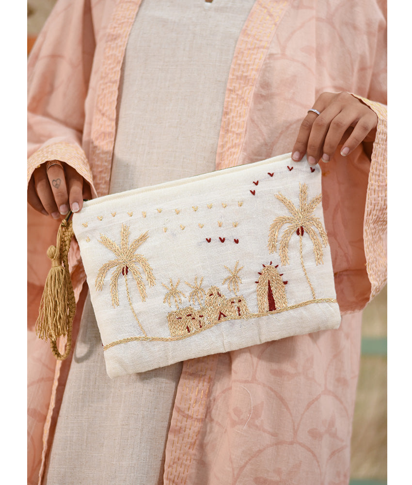 Off White Embroidered Clutch handmade in Egypt & available at Jozee Boutique.