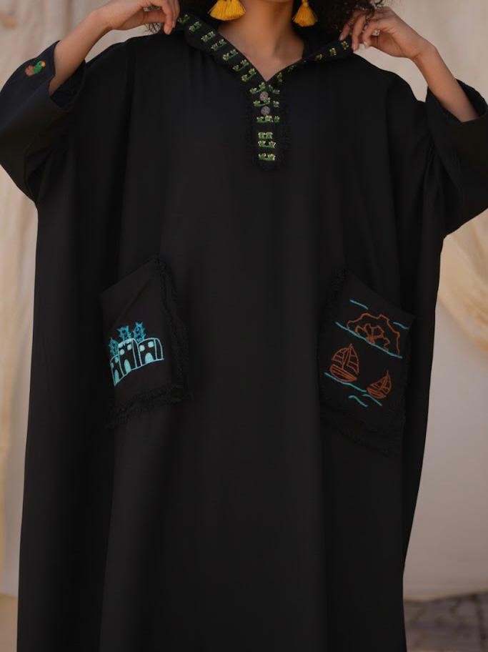 Black Hand Embroidered Linen Kaftan with Hoodie handmade in Egypt & available at Jozee Boutique.