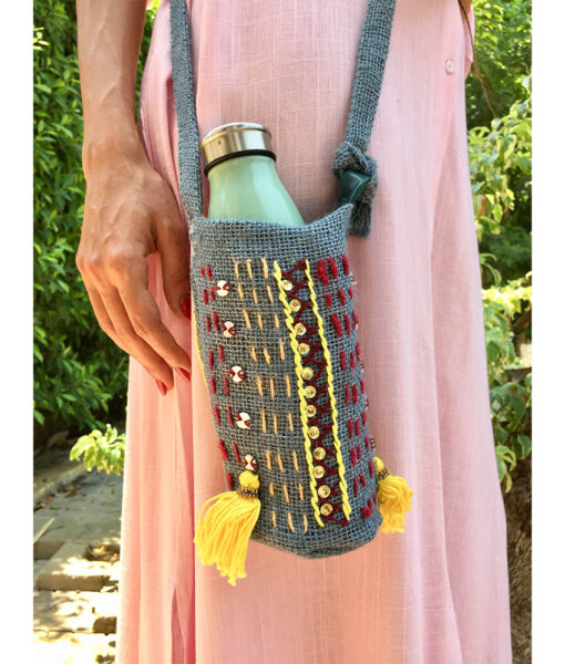 Slate Grey Embroidered Burlap Bottle Cover handmade in Egypt & available at Jozee Boutique.