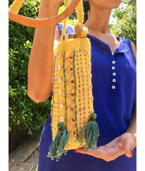 Mustard Embroidered Burlap Bottle Cover handmade in Egypt & available at Jozee Boutique.