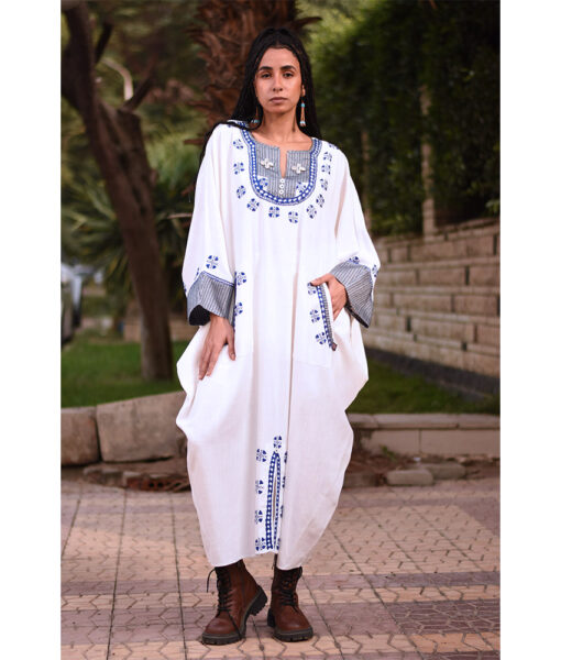 White Siwa Embroidered Linen Kaftan with Silk & Cotton Loom Woven Patches handmade in Egypt & available at Jozee Boutique.