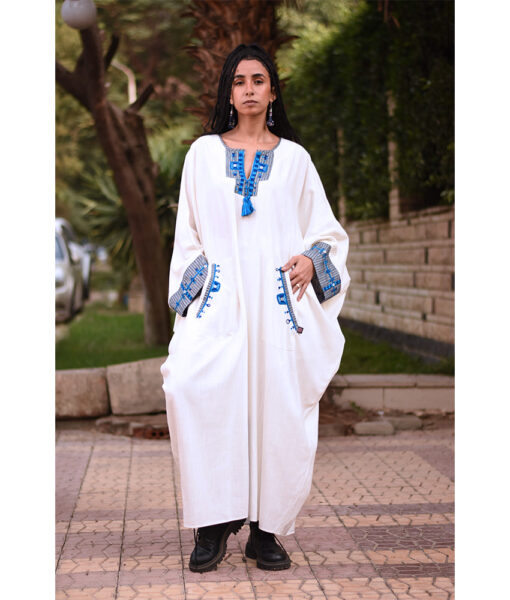 White Siwa Embroidered Linen Kaftan with Silk & Cotton Loom Woven Patches handmade in Egypt & available at Jozee Boutique.