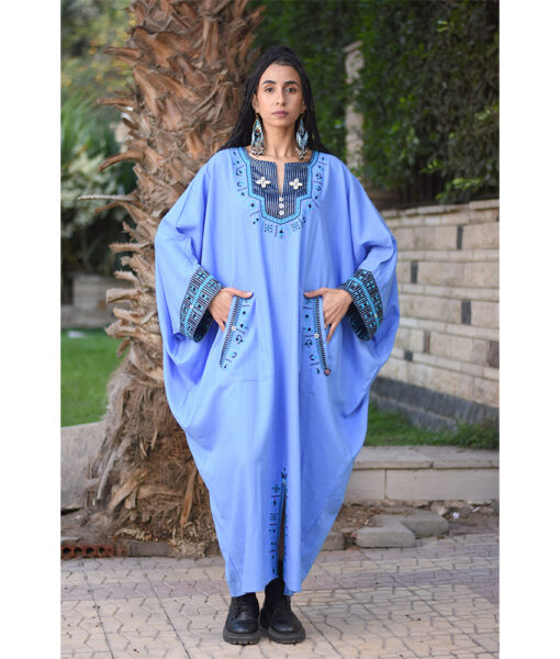 Denim Blue Siwa Embroidered Linen Kaftan with Silk & Cotton Loom Woven Patches handmade in Egypt & available at Jozee Boutique.