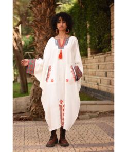 White Siwa Embroidered Linen Kaftan with Silk & Cotton Loom Woven Patches handmade in Egypt & available at Jozee Boutique.