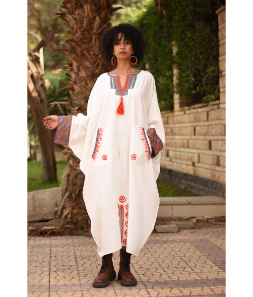 White Siwa Embroidered Linen Kaftan with Silk & Cotton Loom Woven Patches handmade in Egypt & available at Jozee Boutique.