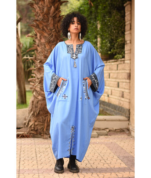 Denim Blue Siwa Embroidered Linen Kaftan with Silk & Cotton Loom Woven Patches handmade in Egypt & available at Jozee Boutique.