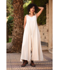 Off White Flowy Jumpsuit/Dress handmade in Egypt & available at Jozee Boutique.