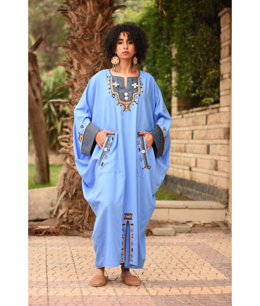 Denim Blue Siwa Embroidered Linen Kaftan with Silk & Cotton Loom Woven Patches handmade in Egypt & available at Jozee Boutique.